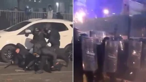 Violent clashes between protesters and police in Turin, Italy, more than 100 officers injured