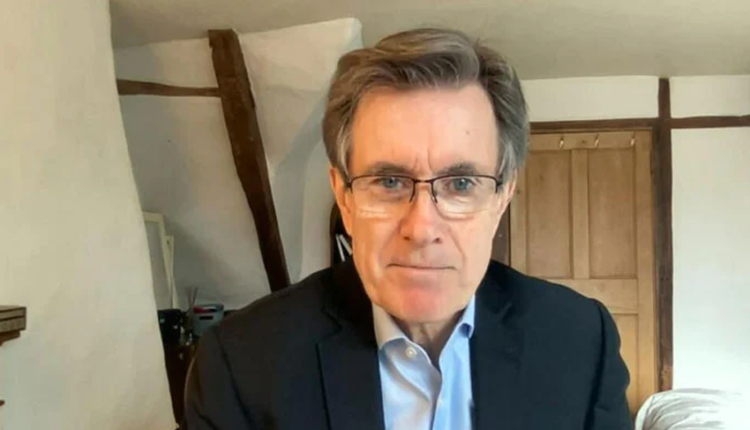 Former British intelligence chief John Swartz