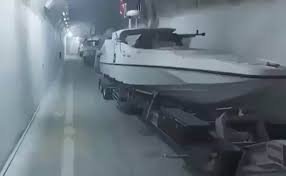 Iran introduces fleet of suicide drone boats in underground 'Missile City'